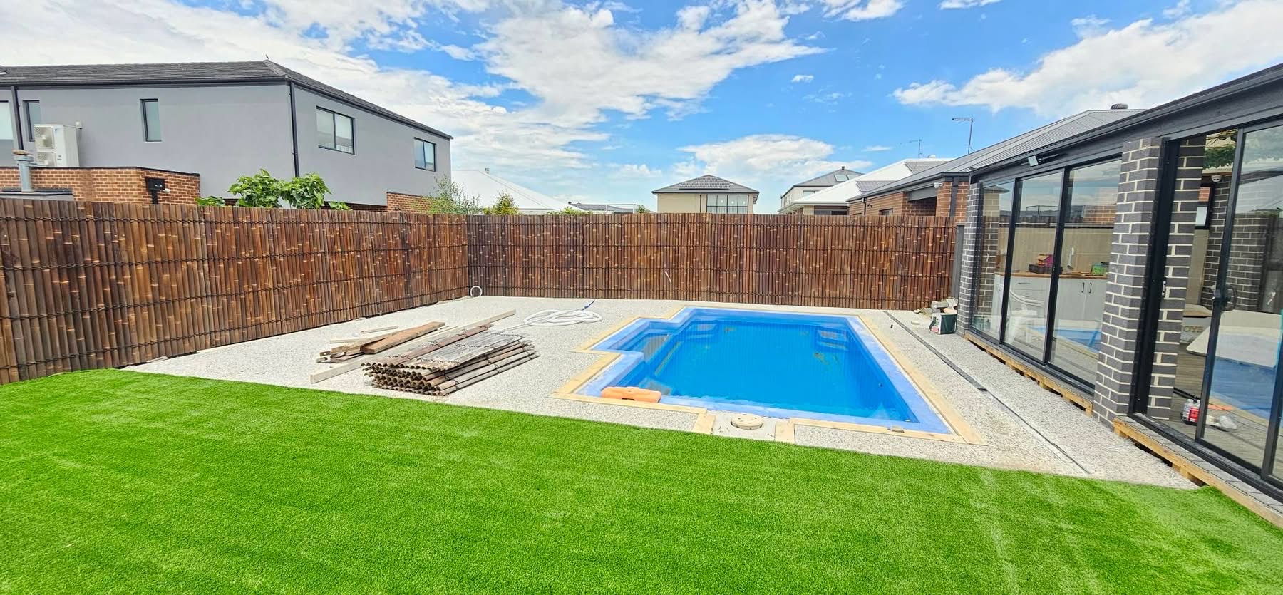 Completed poolside turf and landscape transformation
