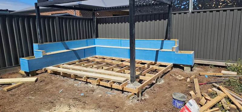 Ground preparation and edging during the EKO poolside build